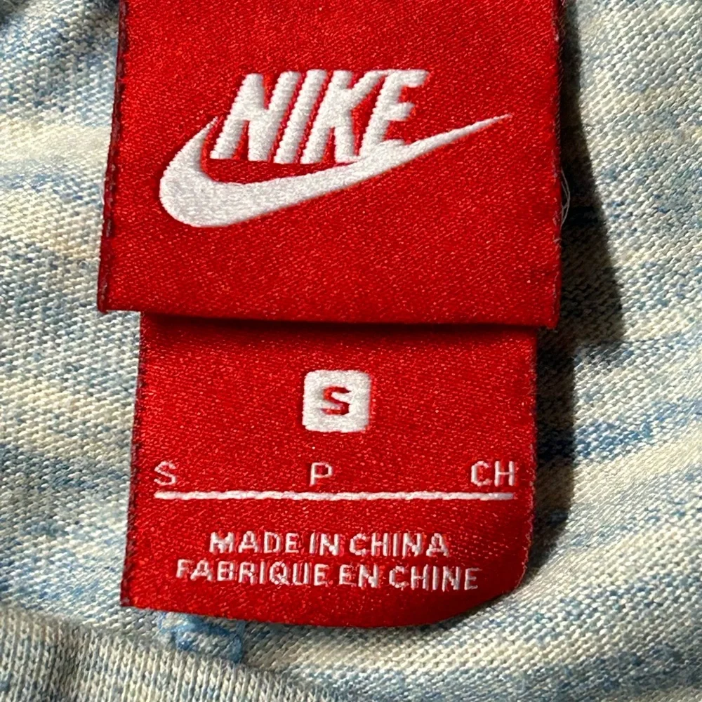 Nike women’s size, small cream and blue joggers with drawstring & front‎ pockets